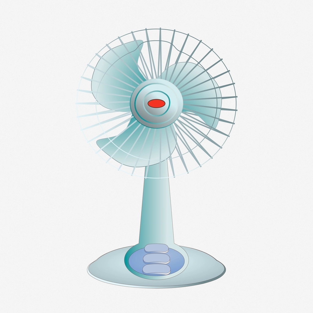 Desk fan in office workspace