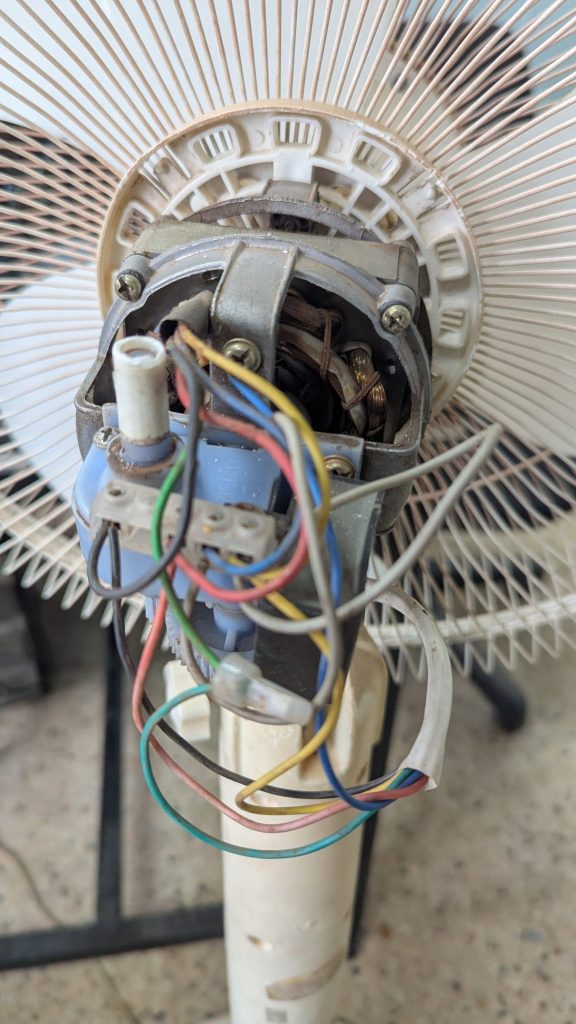 Desk fan in office workspace